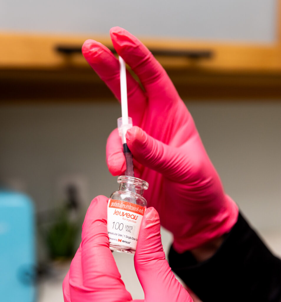 A provider at The Skin Clinic draws several units of the wrinkle relaxer Jeuveau into an ultra-fine needle. All wrinkle relaxers, including Jeuveau, Xeomin, and Dysport in Mankato, are injected using these ultra-fine needles to ensure comfort throughout the injection process.